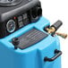 A close-up of a blue Mytee Speedster carpet extractor machine.