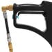 A black and gold hose with a black T-handle connected to a black and gold spray gun.