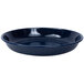 A navy speckled enamelware pasta plate with a black rim.