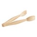 A pair of Cambro beige plastic tongs with white easy-grasp handles.