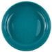 A Crow Canyon Home turquoise speckled enamelware pasta plate with a rim.