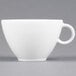 An Arcoroc white oversized cup with a handle.