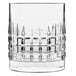 A Luigi Bormioli clear glass with a checkered pattern.