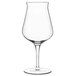 a clear wine glass with a stem