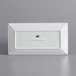 A white rectangular International Tableware porcelain platter with a white border and black text.