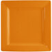 An orange square porcelain plate with a white wide rim.