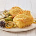 A plate of fried fish and vegetables with Golden Dipt batter on a white plate.