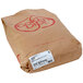 A brown Golden Dipt bag with red text.