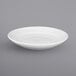 A white International Tableware porcelain pasta bowl with a rolled edge.