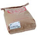 A brown Golden Dipt bag with red text.