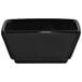 A black square porcelain ramekin.