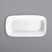 a white rectangular dish on a gray background