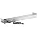 A silver metal ServIt strip warmer with a black power cord.