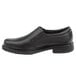 A black Rockport Works men's slip-on dress shoe with a rubber sole.