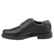 A black Rockport Works men's oxford dress shoe with laces.