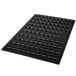 A black Silikomart silicone baking mold tray with 100 mini Madeleine cavities.