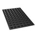 A black silicone baking mold tray with pyramids.