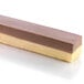 A rectangular brown and white dessert bar made using a Silikomart silicone mold.