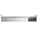 A silver rectangular ServIt strip warmer with a black dial and handle on a stainless steel counter.
