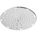 A circular stainless steel shredder plate with holes.
