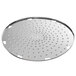 A circular stainless steel shredder plate with holes.
