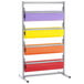 A Bulman four deck paper rack holding colorful paper rolls.