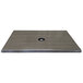 A square charcoal laminate table top with a circular hole in the center.
