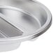 A Vollrath stainless steel round food pan with two compartments.