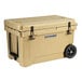 A tan CaterGator outdoor cooler with black wheels.