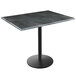 A black table with a grey top.