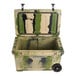 A green and black CaterGator outdoor cooler with wheels.