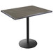 A Holland Bar Stool EnduroTop table with a black base and a charcoal wood laminate top.
