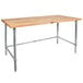 A John Boos wood top work table with a galvanized metal base.