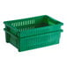 A green plastic Orbis stack-n-nest crate with handles and vents.