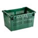 A green Orbis plastic crate with handles and holes.