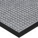 a close-up of a grey carpet