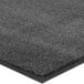 A gray carpet with black trim.