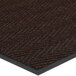 a close-up of a black and brown carpet