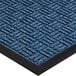 A close up of a navy blue Lavex parquet entrance mat with a black border.