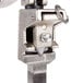 An Edlund heavy-duty stainless steel commercial can opener with a metal bar and metal ring.