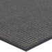 A gray Lavex carpet entrance mat roll with a black border.