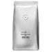 A Caribou Coffee French Roast whole bean coffee bag on a white background.