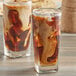 Two glasses of Caribou Coffee French Roast iced coffee with ice.