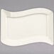 A white rectangular plate with a curved shape.