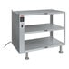 A grey metal Hatco heated take-out shelf with two shelves and a cord.