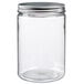 A clear plastic Solia jar with a silver lid.