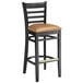 a black and tan bar stool