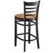 a black and tan bar stool