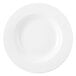 A close up of a Chef & Sommelier white China soup/pasta plate with a wide round rim.