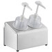 A Steril-Sil stainless steel condiment dispenser with two plastic containers on top.